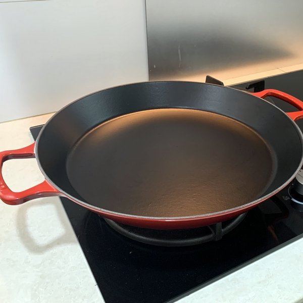 Le Creuset Paella Pan 35cm great for other frying jobs as well as pan pizza.