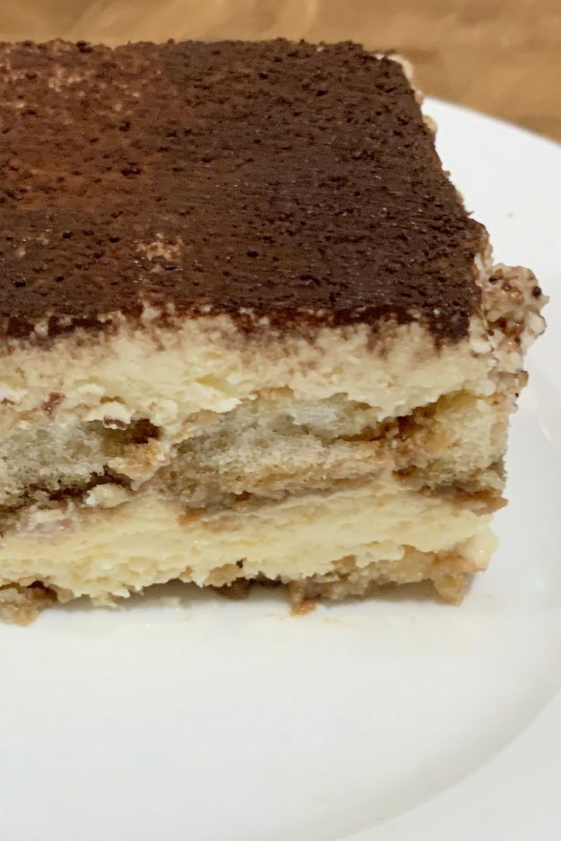 Tiramisu is a layered dessert of biscuit/sponge and a rich yet light mascarpone mix with Italian liqueur and espresso coffee.  The literal translation is 'pick me up' or, and I like this variation, 'cheer me up', as does for me. The recipe is relatively simple but some patience is required. 